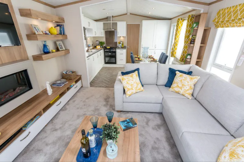 Open plan lounge and kitchen inside elite and platinum holiday caravan at Home Farm Holiday Park Somerset